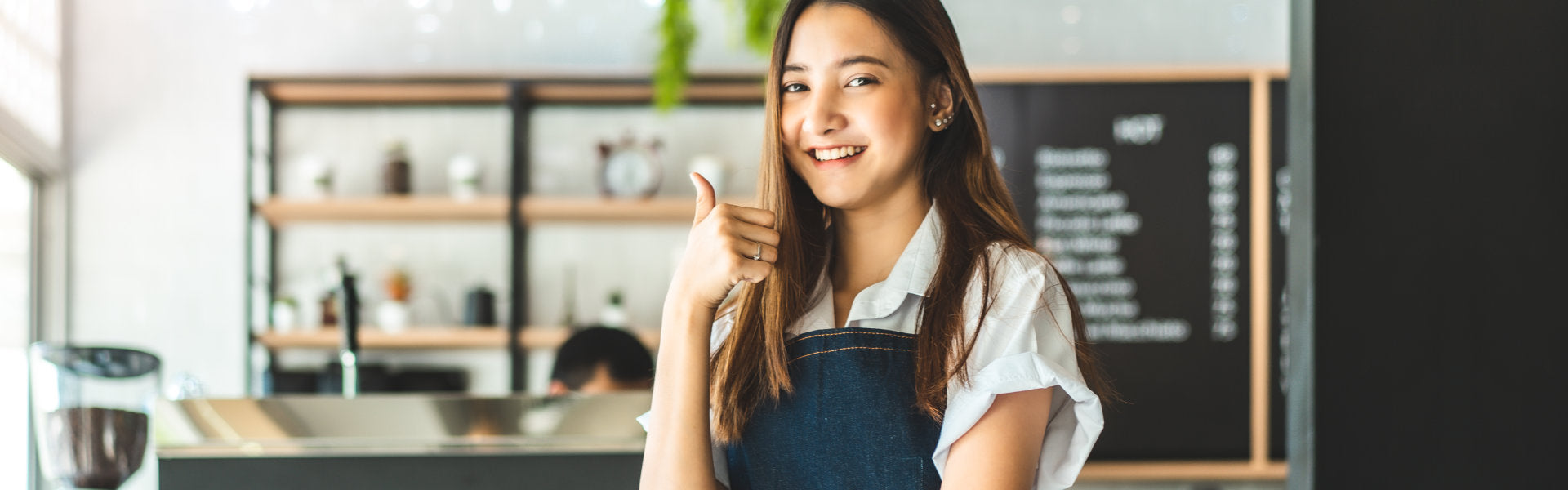 A female coffee barista